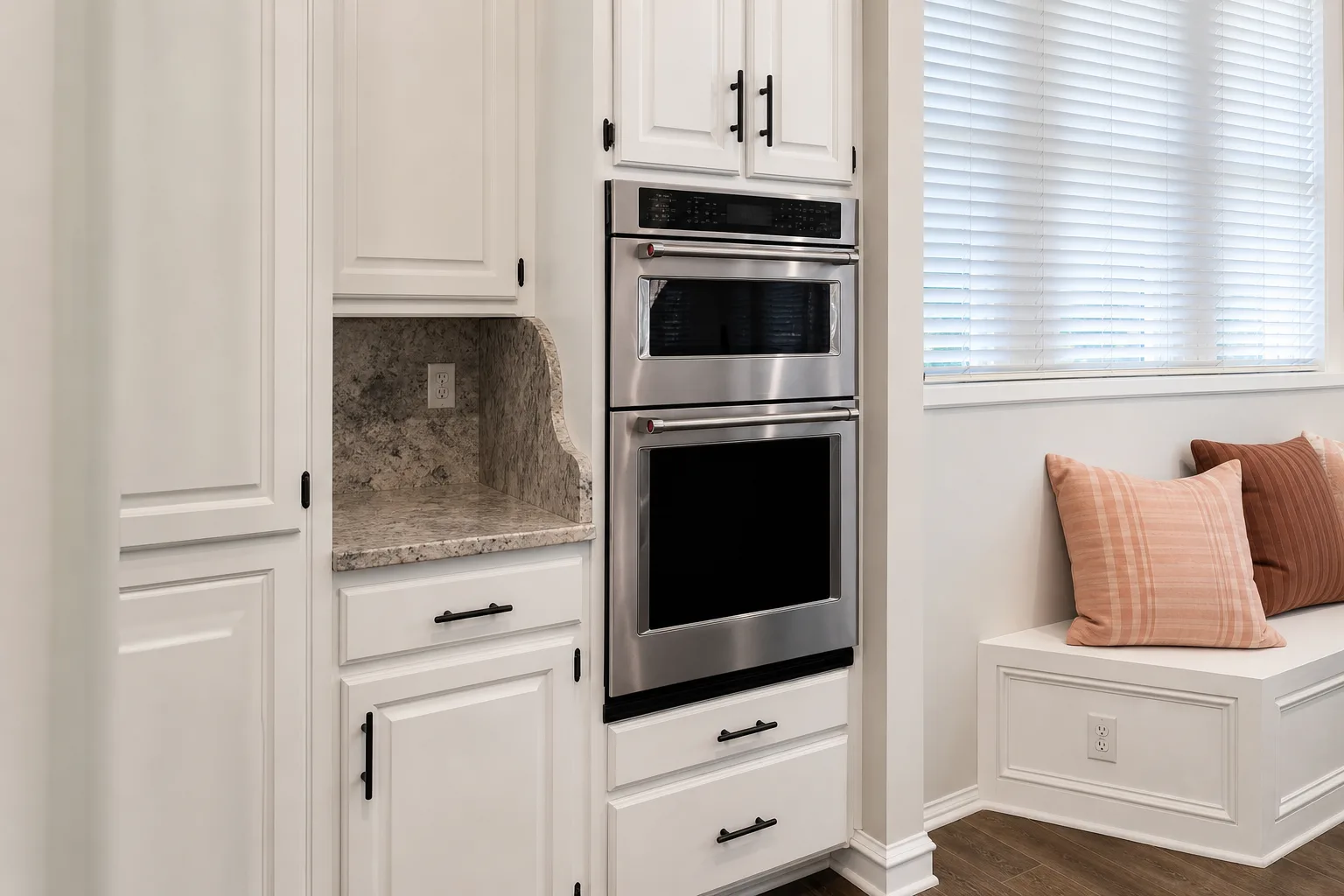 Built-in double oven and custom cabinetry