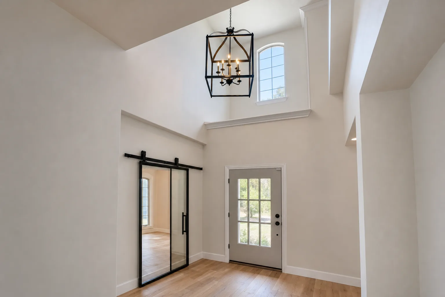 Lantern-style pendant over a foyer entry
